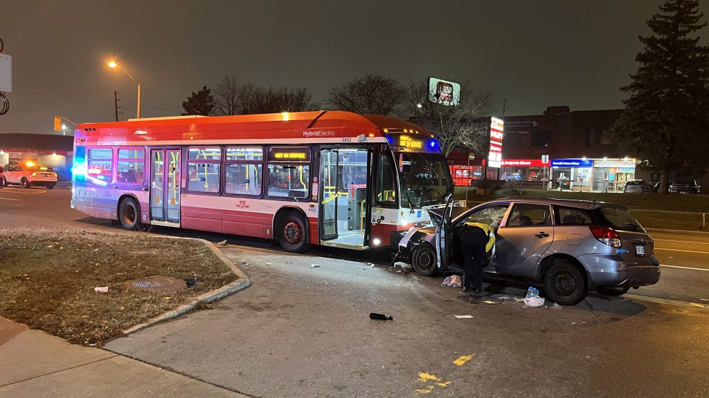 Three people were taken to hospital after a car and TTC bus collided