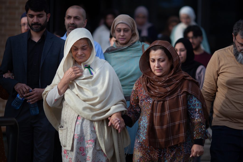 Family and friends of the Afzaal family after a verdict in the Nathaniel Veltman murder trial was reached on Nov. 16, 2023