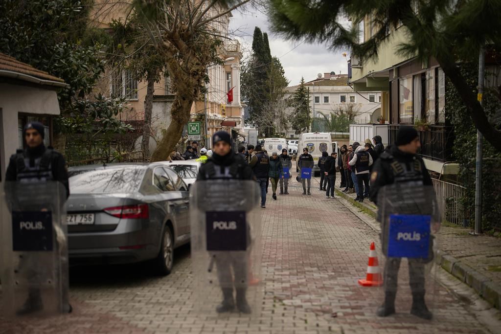 2 masked men kill a person in attack on Catholic church in Istanbul. Officials detain 2 ISIS members