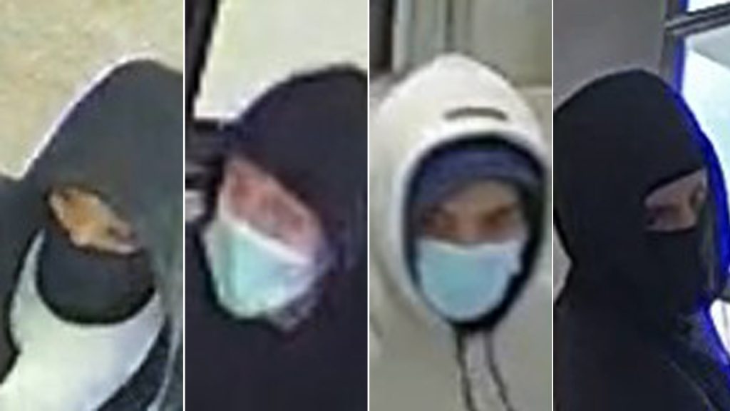 Surveillance images of four suspects wanted in connection with a robbery at Yorkdale Mall