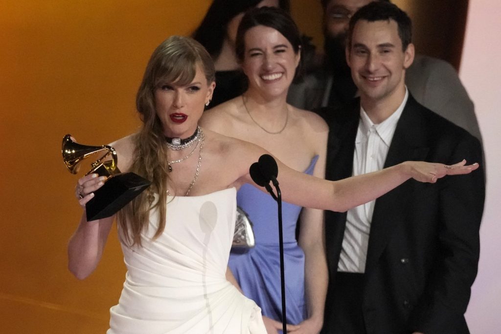 Taylor Swift wins album of the year at Grammys for 4th time, setting new record