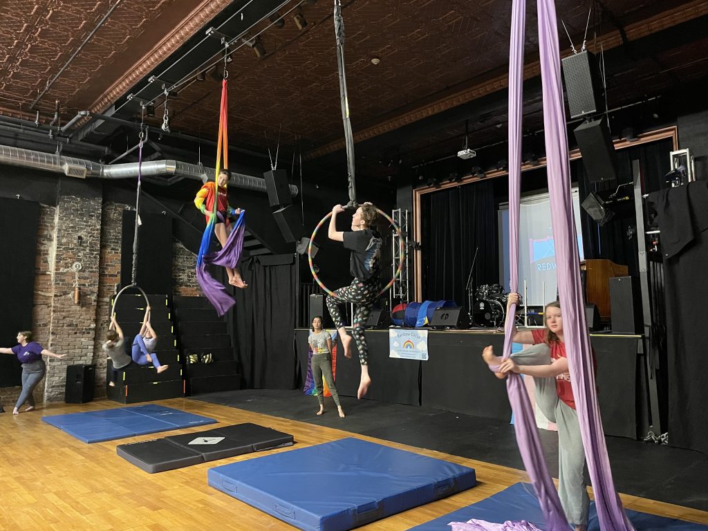 Students practice their circus skills during Rainbow Circus classes at The Redwood.