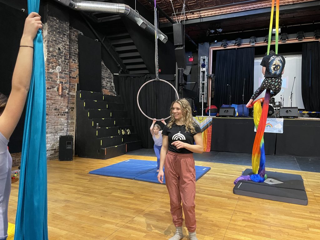 Jayeden Walker, program director of Rainbow Circus, teaches youth in The Redwood Theatre. 