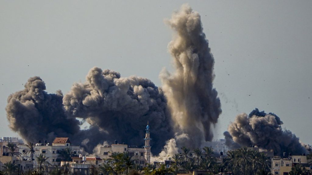 Smoke and explosion following an Israeli bombardment inside the Gaza Strip