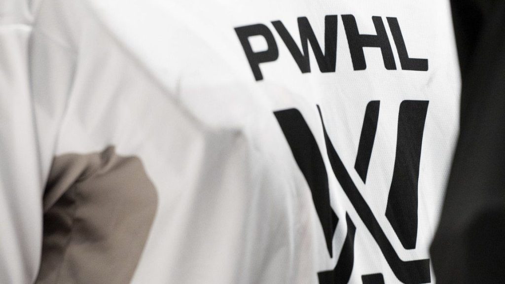 A PWHL logo is seen on a player's jersey