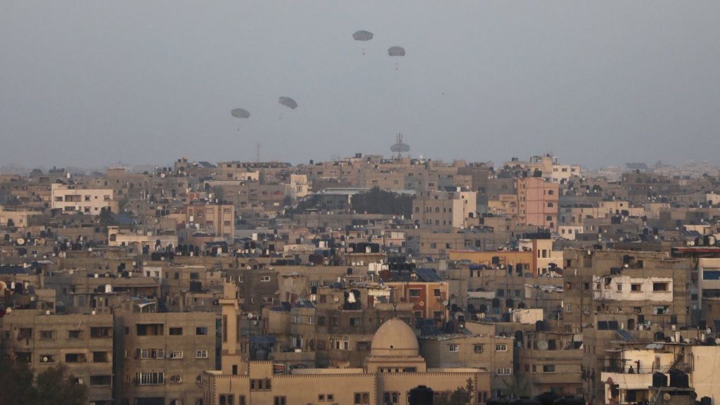 Humanitarian aid is dropped by the United States over Gaza City