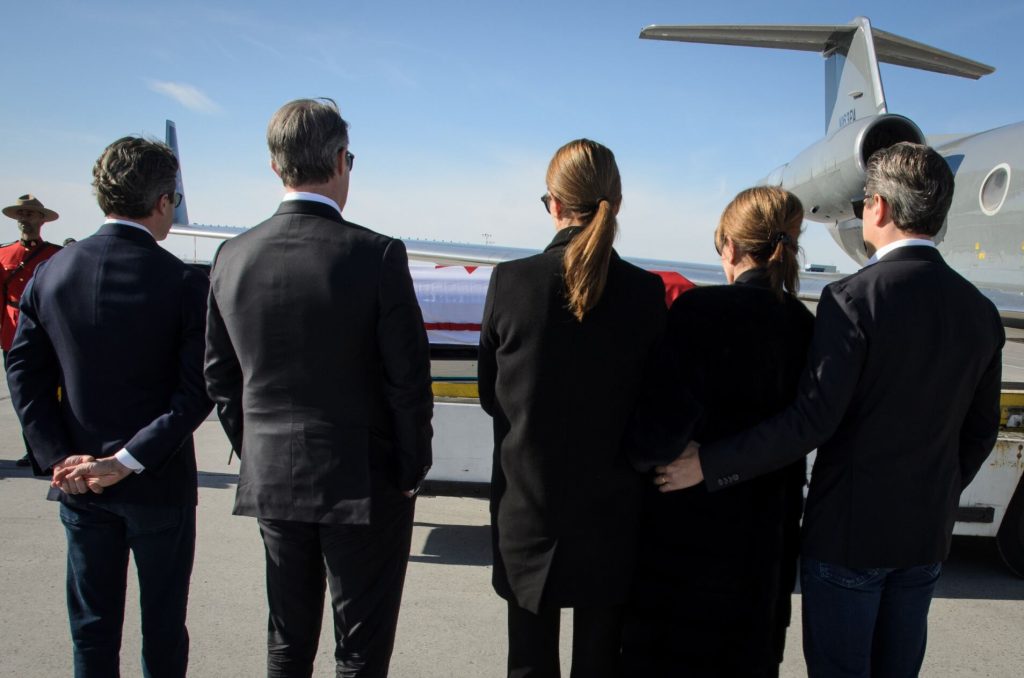 Members of the immediate Mulroney family gather in front of the casket of the Right Honourable Brian Mulroney.