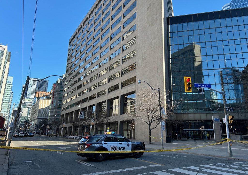 Toronto police block off a section of Bay Street for a suspicious package investigation on March 11, 2024