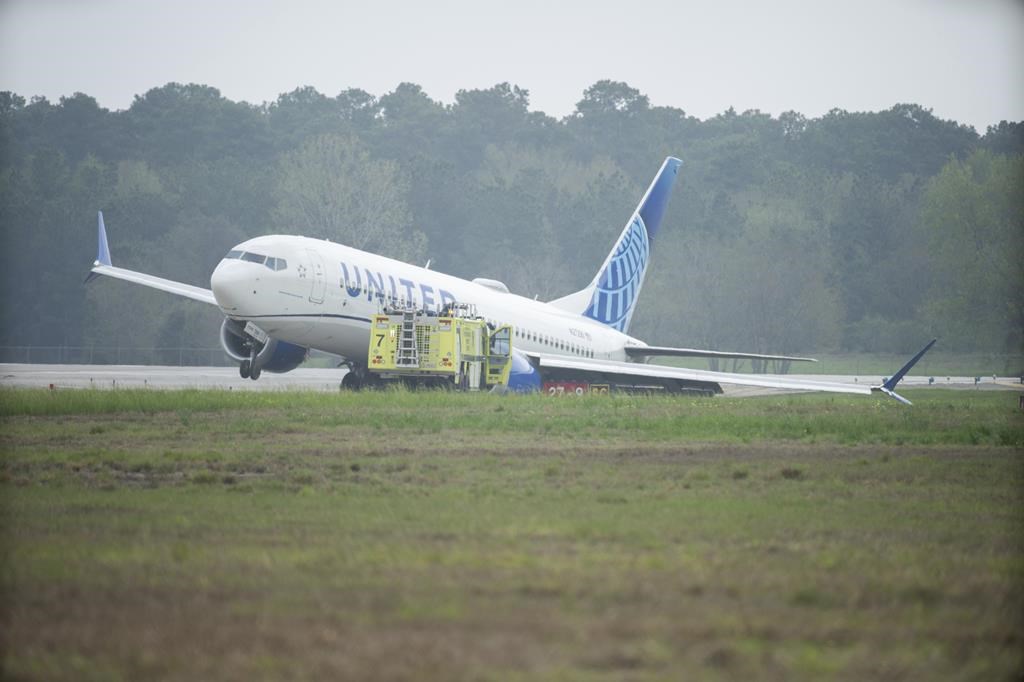 United Airlines plane rolls off runway in Houston