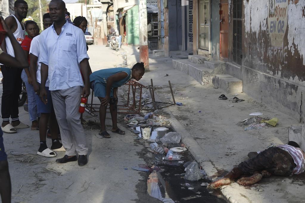 Gangs attack police stations in Haiti as Caribbean leaders call an emergency meeting Monday