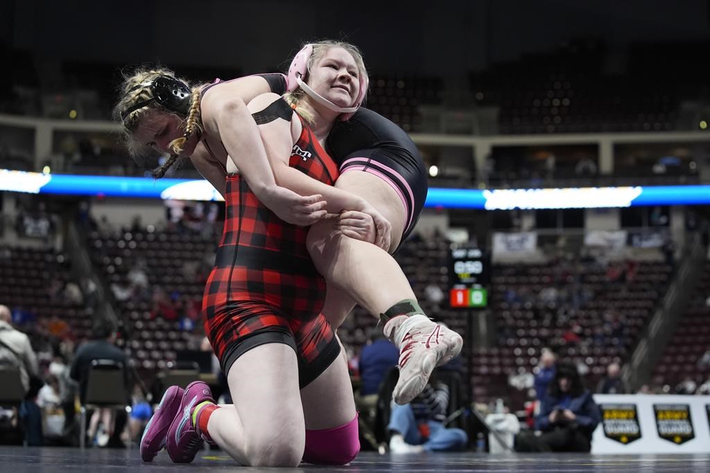 Girls are falling in love with wrestling, the nation's fastest-growing high  school sport