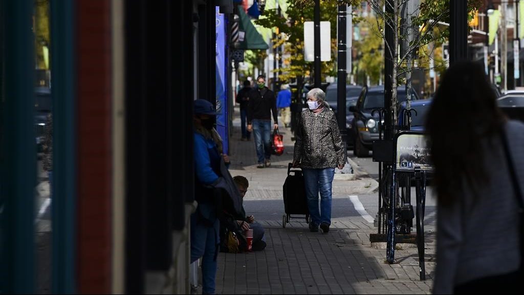 People shop in the Glebe community of Ottawa on Oct. 15, 2020