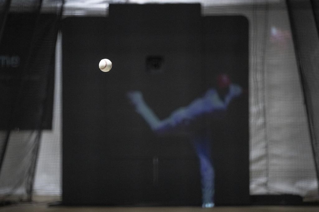 Robots replicate reality: High-tech pitching machine mimics every pitcher