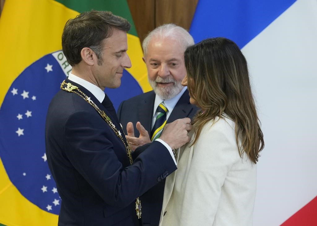 France's Macron embraces Brazil's Lula -- and the memes poking fun at their 'wedding'