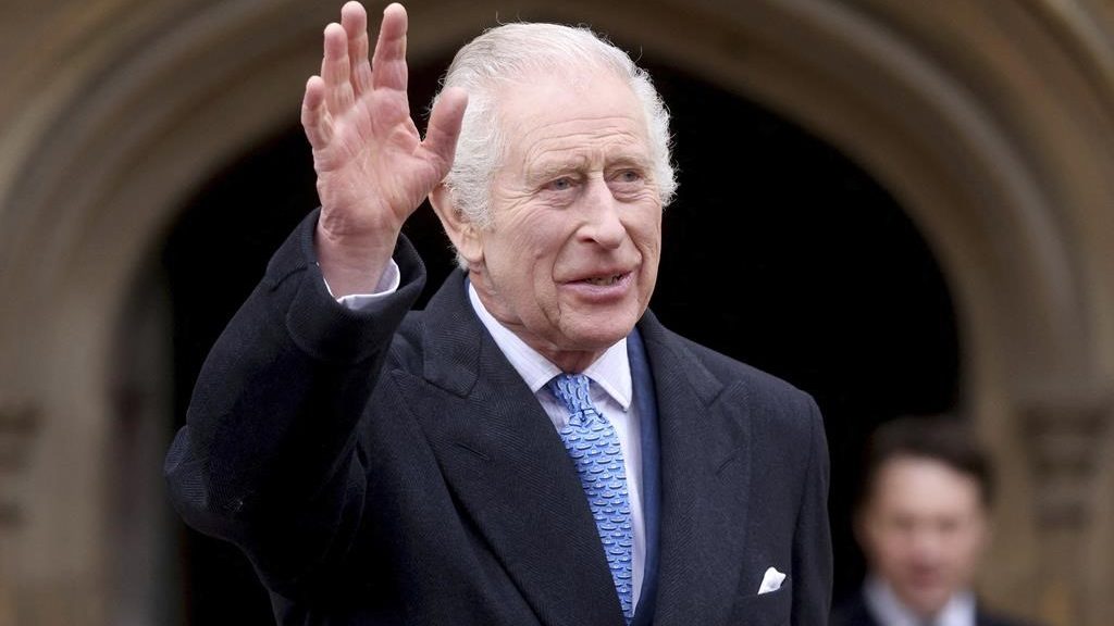 Britain's King Charles III waves as he leaves after attending the Easter Matins Service at St. George's Chapel, Windsor Castle, England, on March 31, 2024