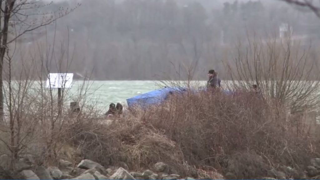 Police at the scene after a man's body was found at Pier 4 Park near the water's edge on April 3, 2024.