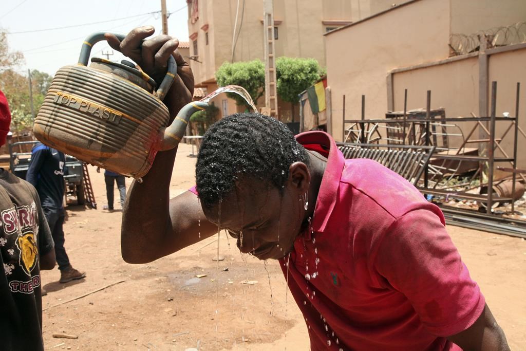 Laborers and street vendors in Mali find no respite as deadly heat wave surges through West Africa