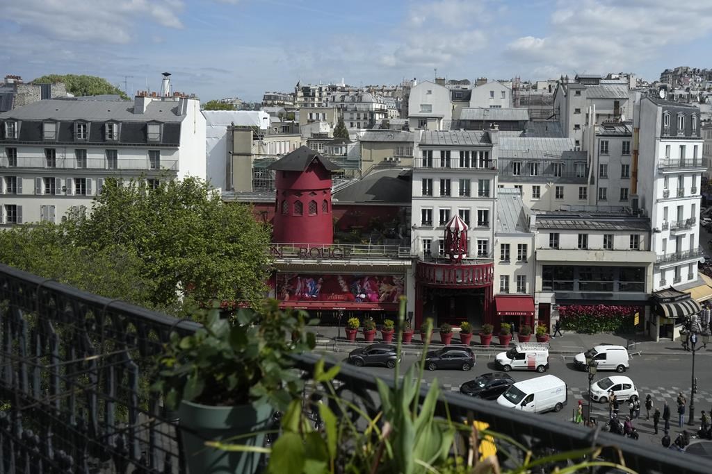 The windmill sails at Paris' iconic Moulin Rouge have collapsed. No injuries are reported