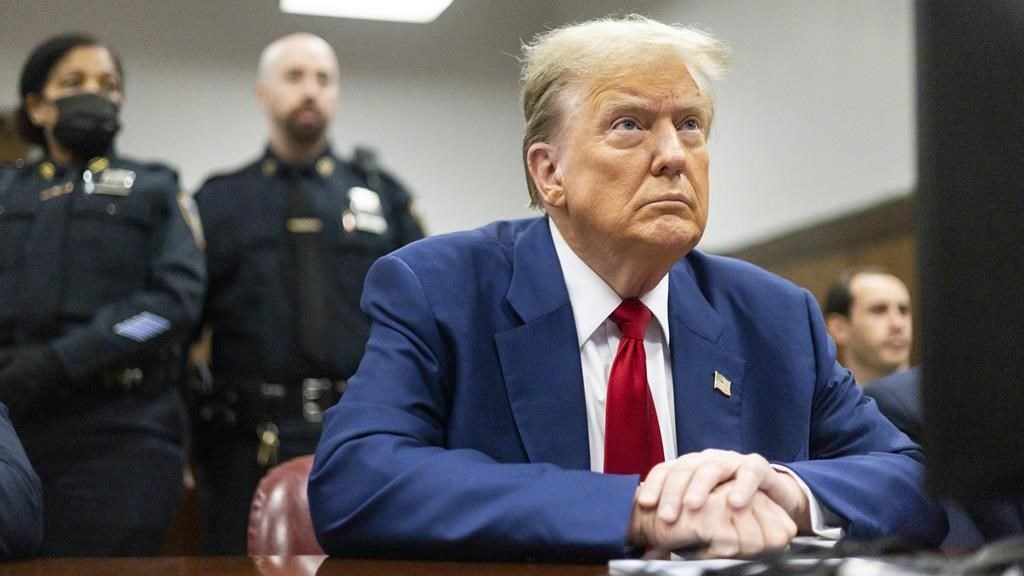 Former U.S. president Donald Trump appears at Manhattan criminal court before his trial in New York on April 30, 2024