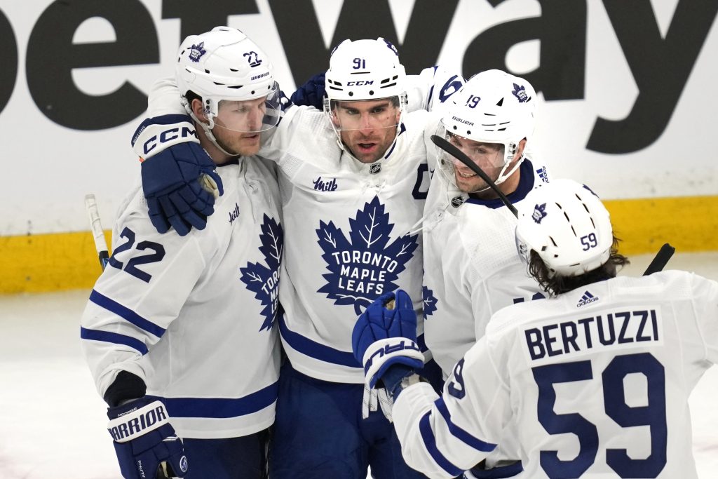 Toronto Maple Leafs center John Tavares (91) is congratulated after his goal against Boston Bruins goaltender Linus Ullmark (not shown) during the second period of Game 2 of an NHL hockey Stanley Cup first-round playoff series, Monday, April 22, 2024, in Boston.