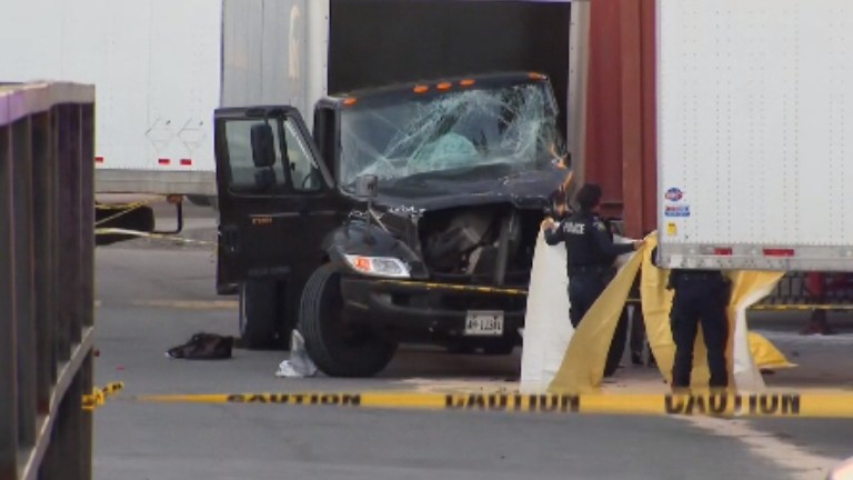 Driver killed after truck strikes stationary trailer in Mississauga