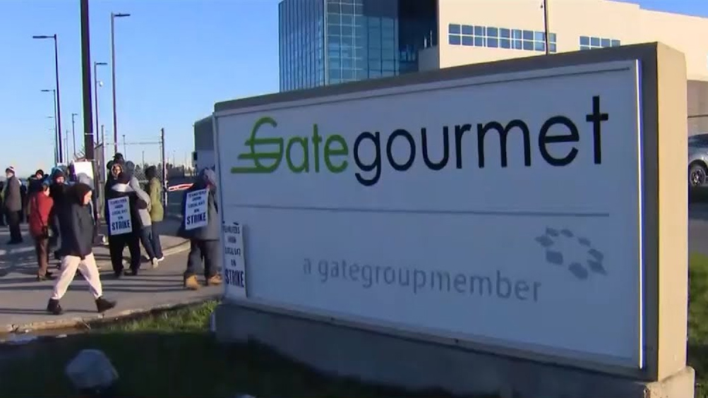 Striking workers picket outside the Gate Gourmet offices in Toronto.