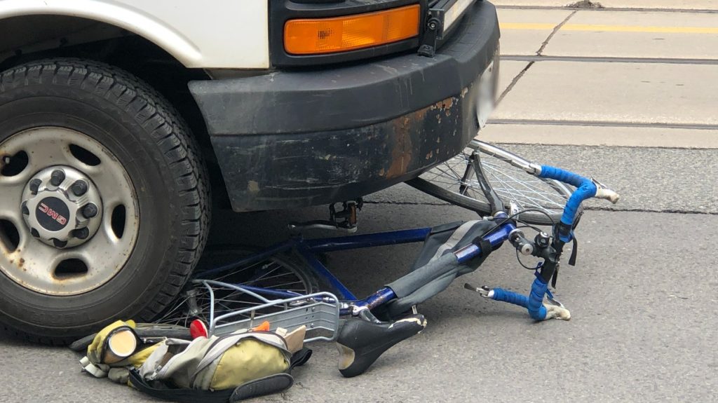 A cyclist was struck by a commercial van near Dundas Street West and McCaul Street on May 14, 2024