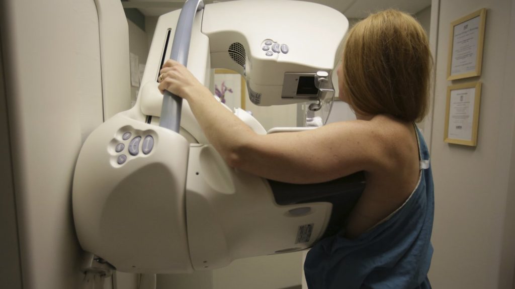 A woman gets a mammogram at the University of Michigan Cancer Center