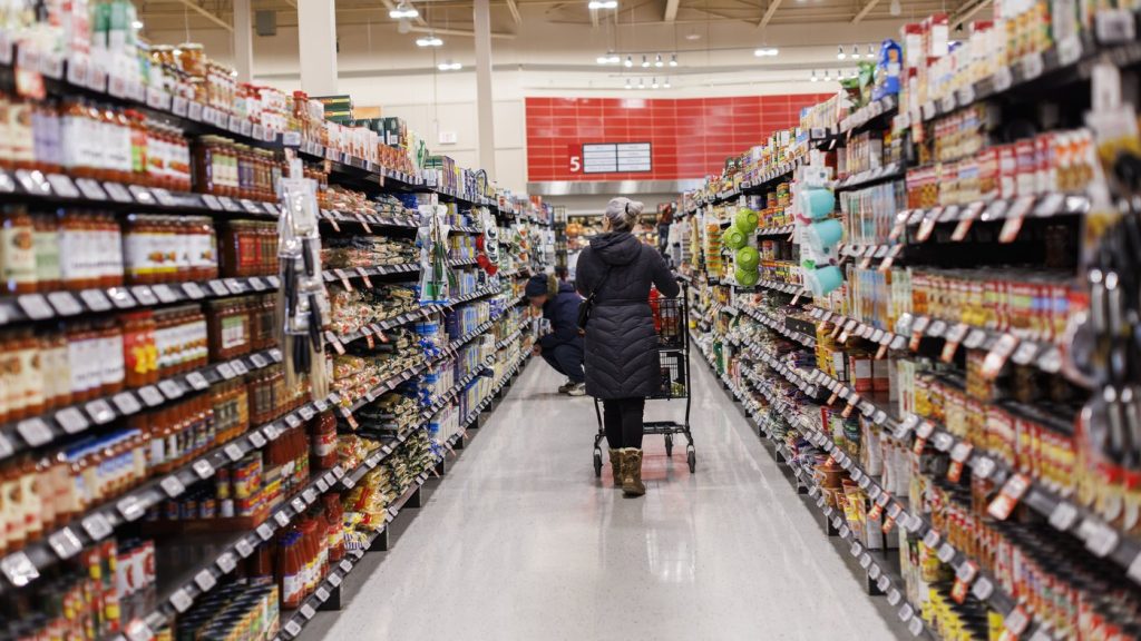 A customer browses an aisle at a grocery store in Toronto on Feb. 2, 2024