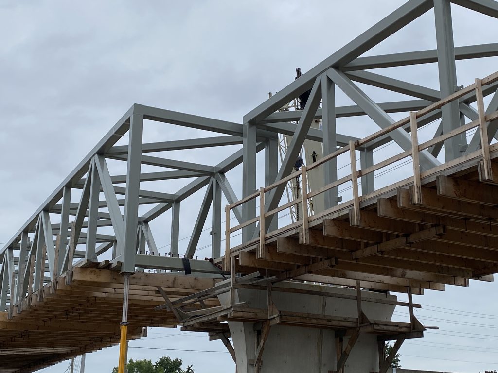 A dump truck hit a pedestrian bridge under construction on North Service Road near the QEW in Mississauga on June 11, 2024