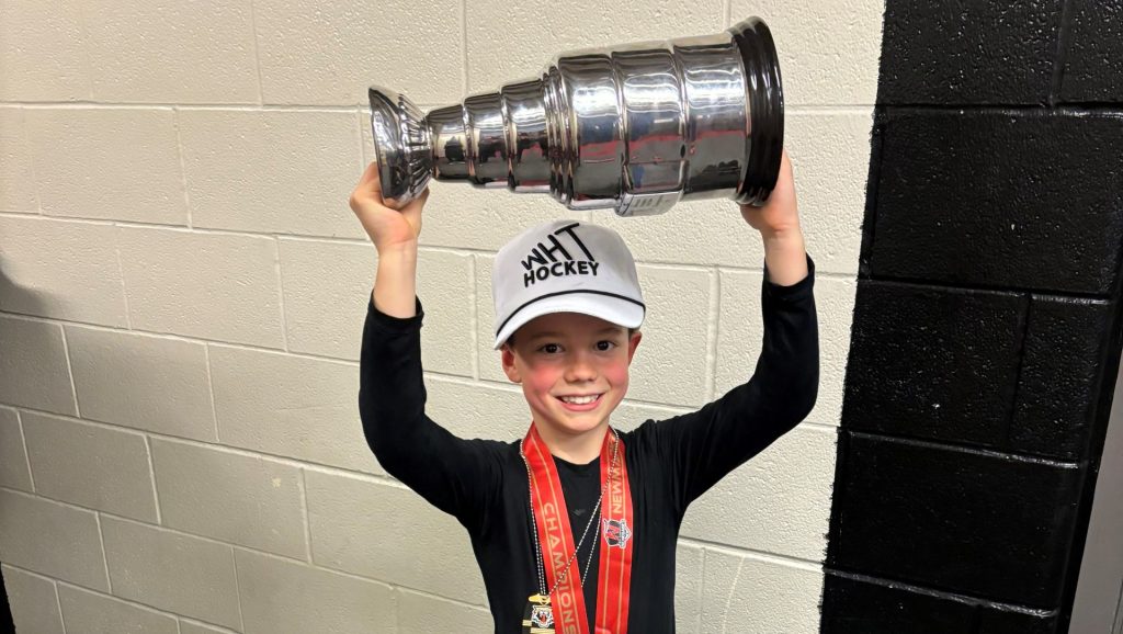 9-year-old from Aurora falls in love with the game of hockey