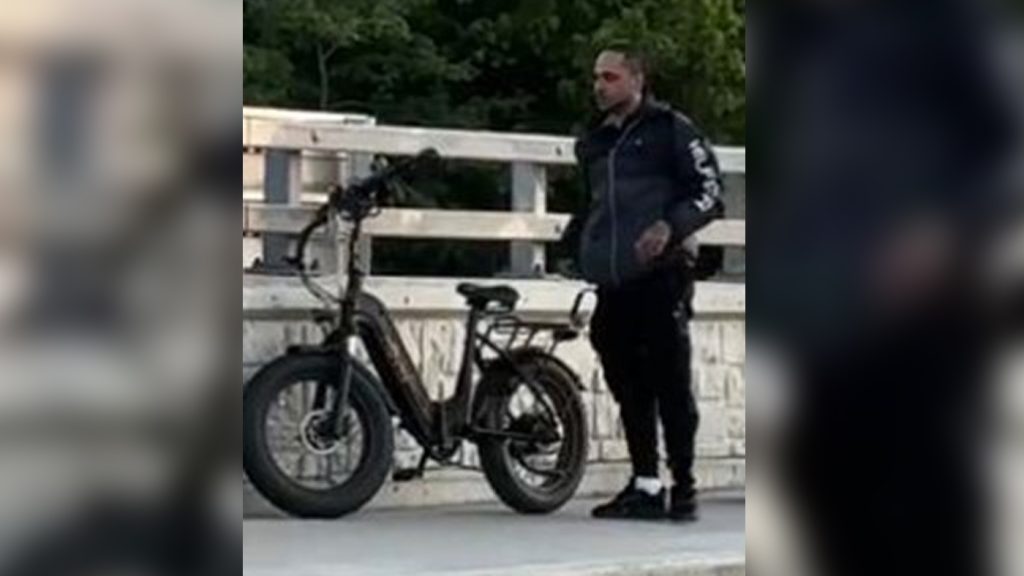 Surveillance photo of a cyclist wanted in connection with an alleged assault of a pedestrian in North York.