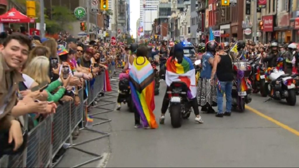 Downtown Toronto streets fill with thousands of revelers, rainbow flags for Pride parade