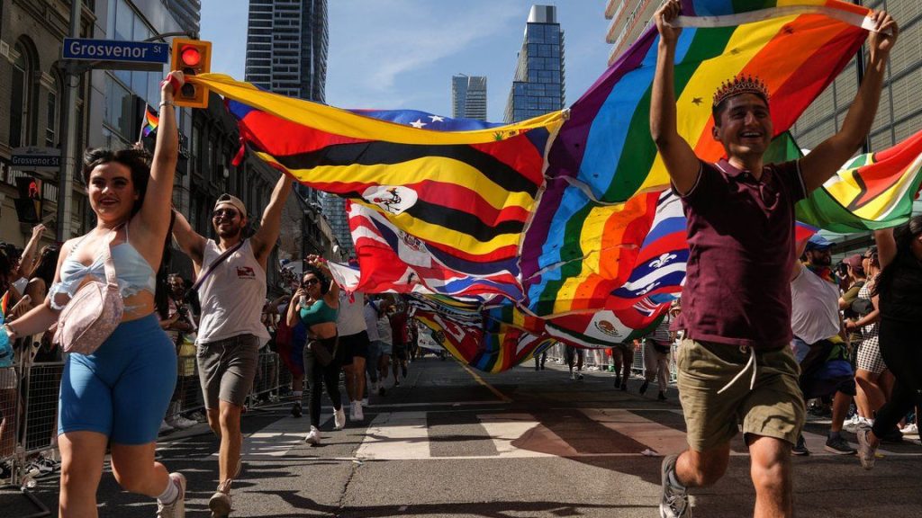 Downtown Toronto streets fill with revelers, rainbow flags for city's Pride parade