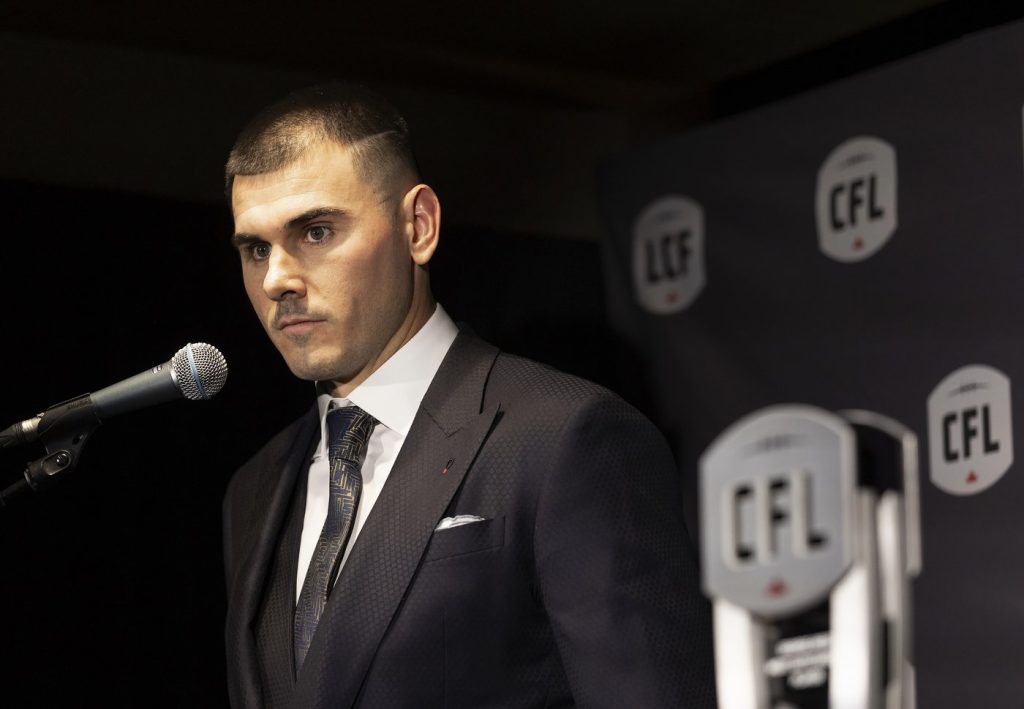 A lawsuit filed against quarterback Chad Kelly and the Toronto Argonauts by a former assistant strength-and-conditioning coach has been settled. Kelly with his award for Most Outstanding Player at the 2023 Canadian Football League (CFL) Awards in Niagara Falls, Ont. Thursday, Nov. 16, 2023. THE CANADIAN PRESS/Tara Walton