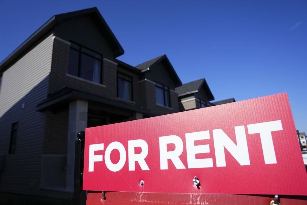 A for rent sign is displayed on a house in Ottawa