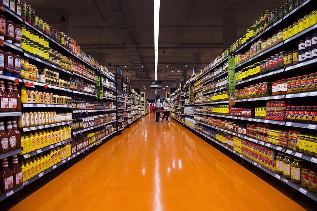 People shop at a Loblaws store in Toronto