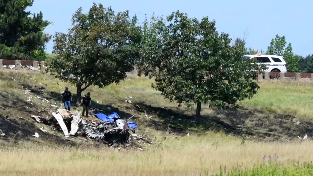 Authorities investigate the site of a plane crash in Youngstown, New York