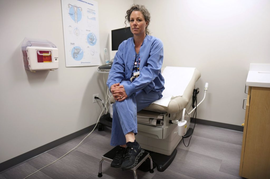 After years of fighting Iowa's strict abortion law, clinics also prepared to follow it