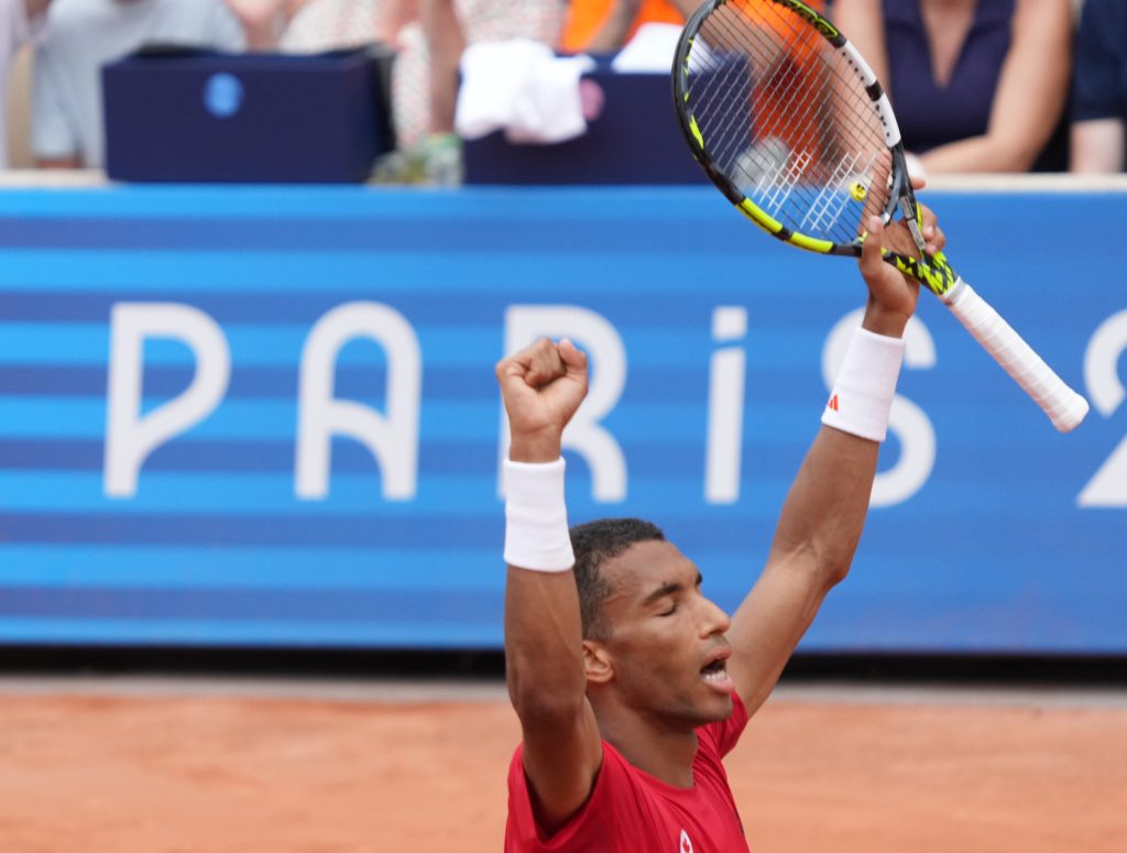 Felix Auger-Aliassime of Canada celebrates his win over Daniil Medvedev of AIN during third round in the men's singles at the 2024 Summer Olympics in Paris, France on Wednesday, July 31, 2024.