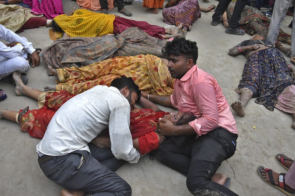 A stampede at a religious event in India has killed at least 105 people, many women and children