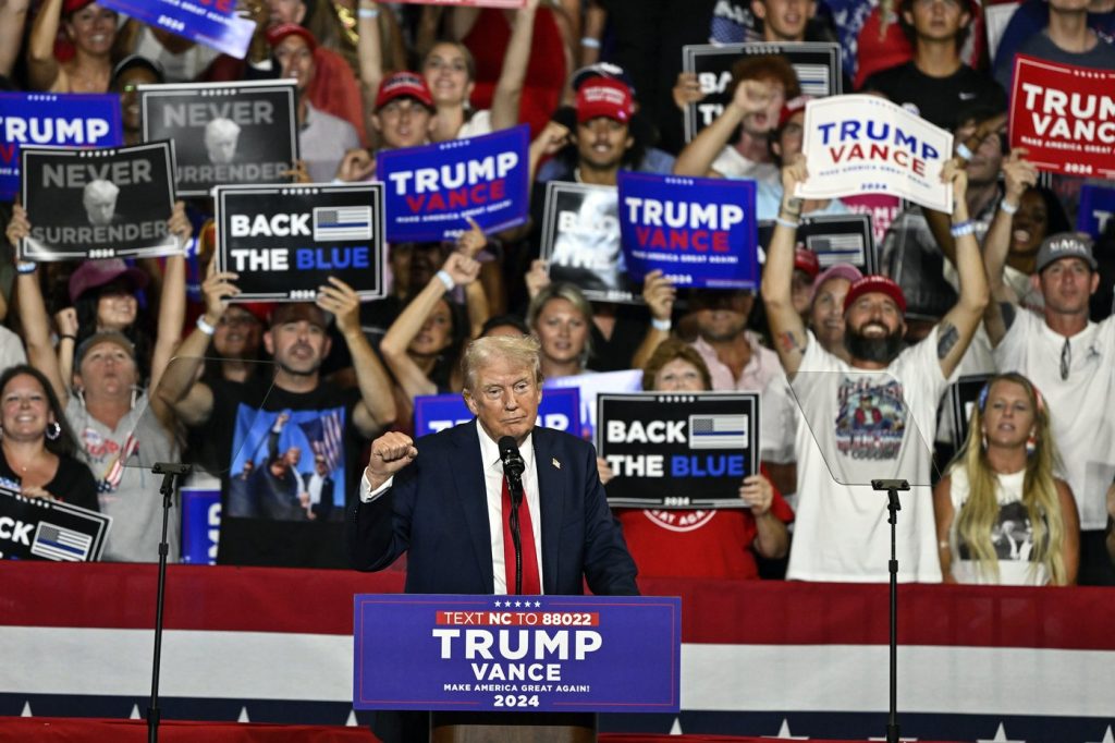 Trump turns his full focus on Harris at his first rally since Biden's exit from the 2024 race