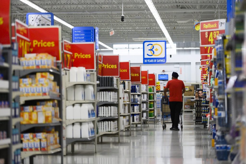 People shop at a Walmart in Vaughan, Ont., on Wednesday, July 2, 2024.