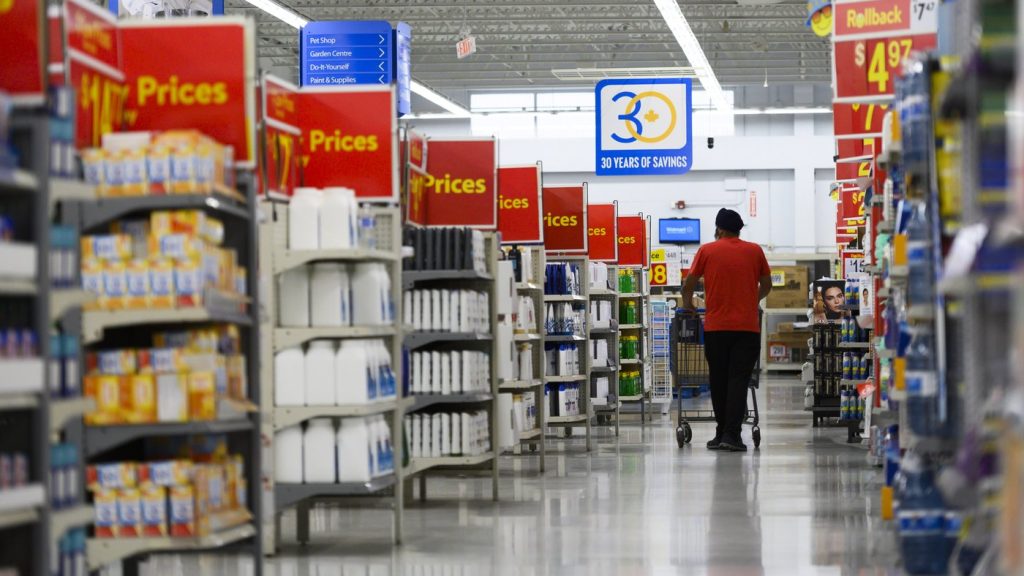 People shop at a Walmart in Vaughan, Ont., on July 2, 2024