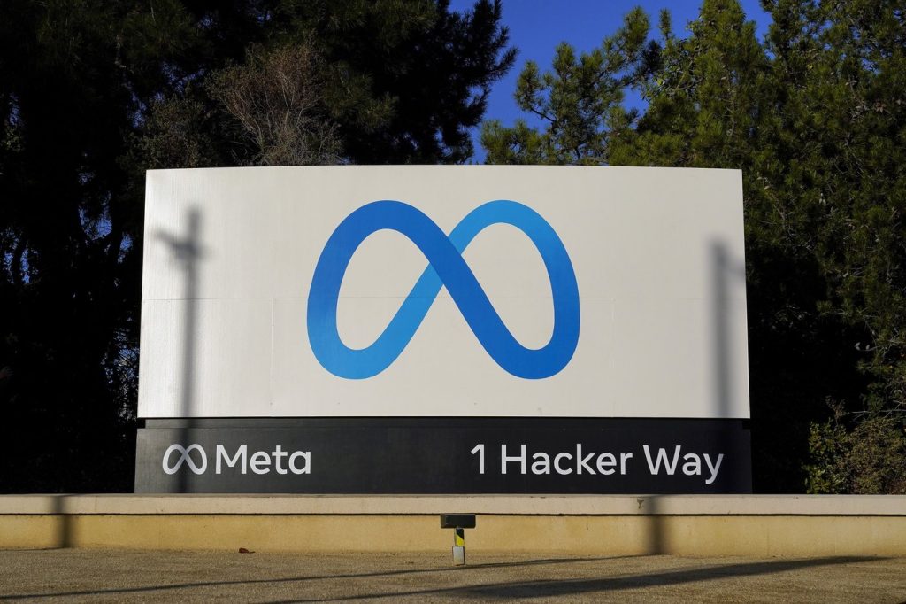 Meta's logo is seen on a sign at the company's headquarters in Menlo Park, Calif.,