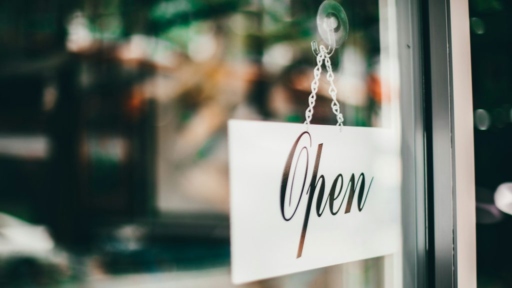 An 'open' sign on a storefront