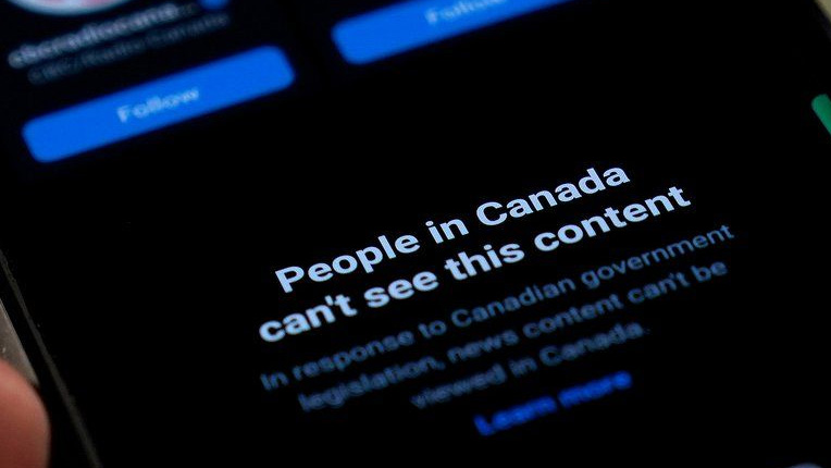 A smartphone showing Meta's blocking of Canadian news content