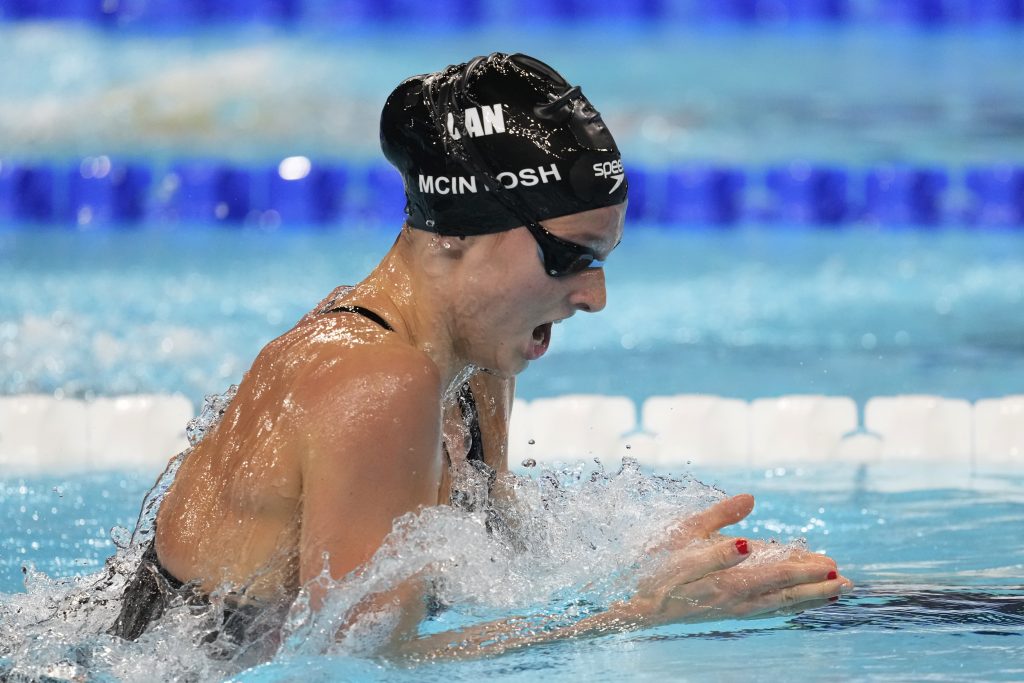 Summer McIntosh sets Olympic record in winning third gold medal in swimming