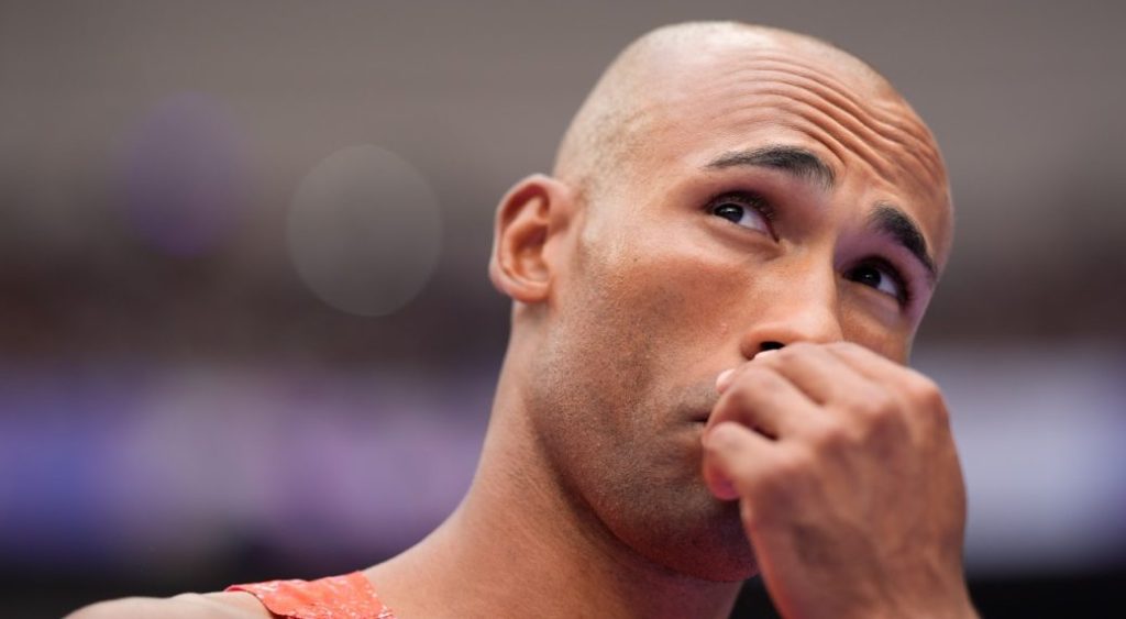 Damian Warner, of Canada, reacts in the decathlon discus throw at the 2024 Summer Olympics, Saturday, Aug. 3, 2024, in Saint-Denis, France.