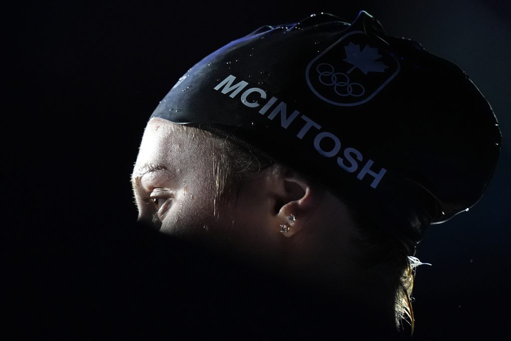 Canada's Summer Mcintosh gives an interview after winning the women's 200-meter individual medley final at the Summer Olympics in Nanterre, France, Saturday, Aug. 3, 2024.